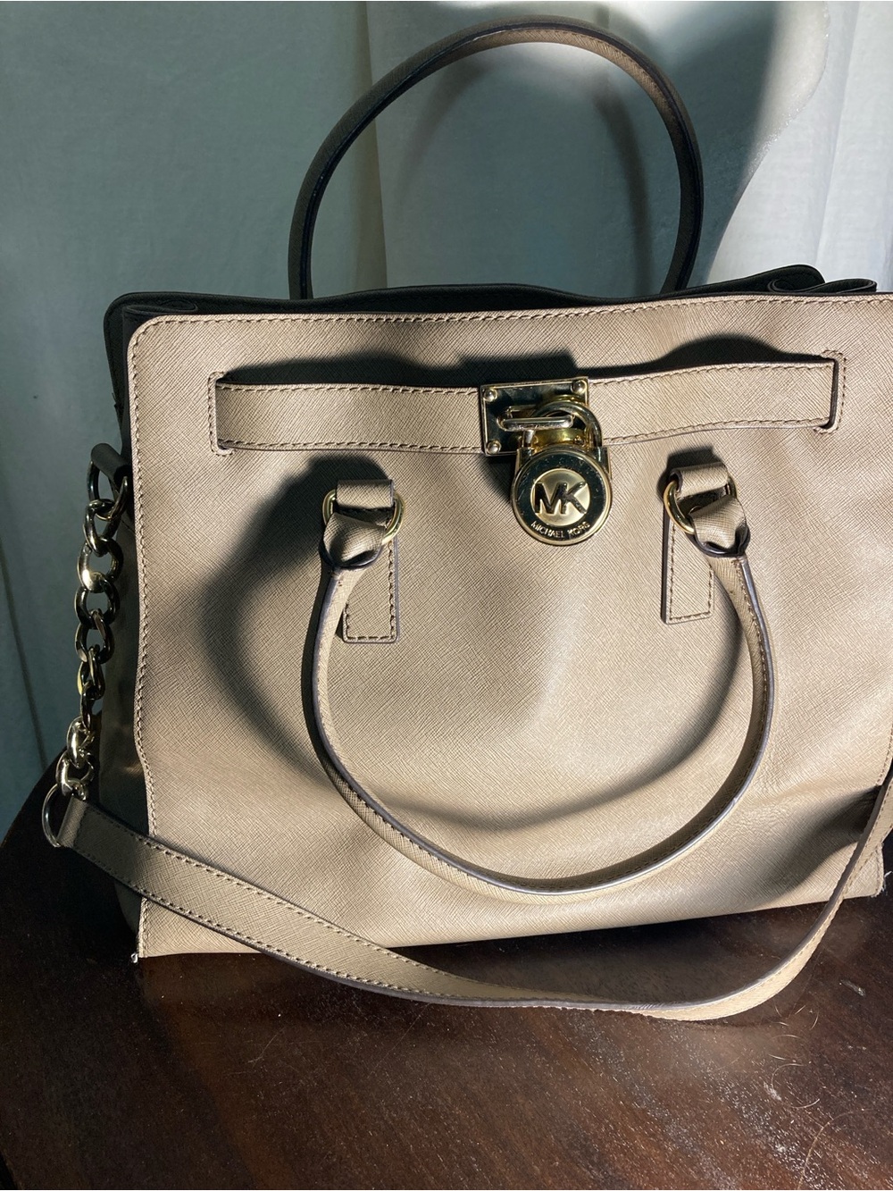 Michael Kors Hamilton Satchel featuring signature gold-tone padlock hardware